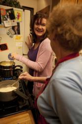 Mother and daughter cooking